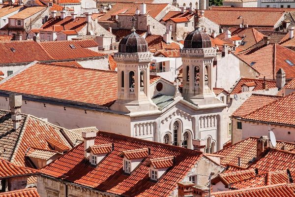 Croatia Dalmatia Dubrovnik Church among red terra cotta tile roofs in the old town of Dubrovnik